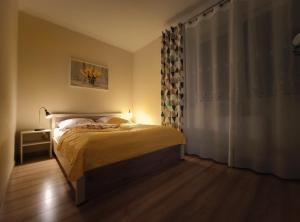 Postel nebo postele na pokoji v ubytování Apartament A1 MODERNO Parking