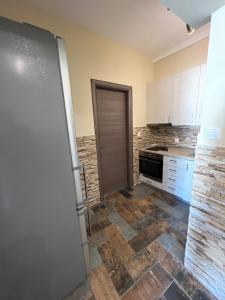 Kuchyňa alebo kuchynka v ubytovaní Jacuzzi Suites