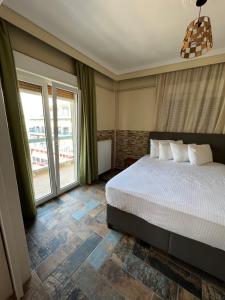 Posteľ alebo postele v izbe v ubytovaní Jacuzzi Suites