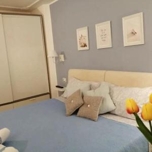 A bed or beds in a room at Quattro Canti Valù