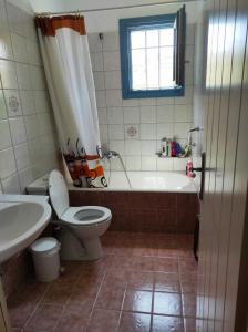 Um banheiro em Villa Mariza