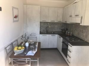 Kuchyň nebo kuchyňský kout v ubytování Appartamento nel cuore della Costa D'Amalfi
