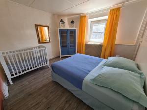 En eller flere senge i et værelse på Maison de pêcheur typique proche plage