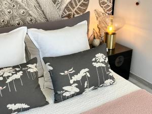 Voodi või voodid majutusasutuse VILLA DE LA LUZ Luxury Guesthouse toas