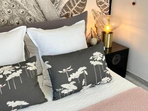 Posteľ alebo postele v izbe v ubytovaní VILLA DE LA LUZ Luxury Guesthouse