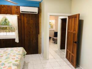 Voodi või voodid majutusasutuse Mariposa Lodge toas