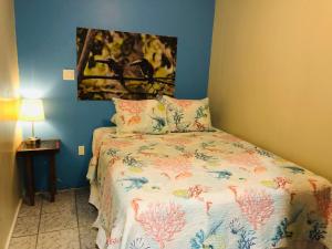Voodi või voodid majutusasutuse Mariposa Lodge toas