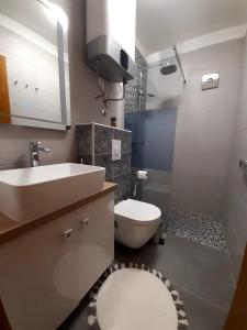 Koupelna v ubytování Solis Adriaticum Apartments