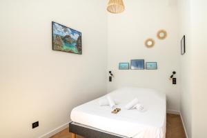 Posteľ alebo postele v izbe v ubytovaní Le Saint Firmin