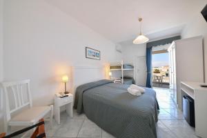 Postel nebo postele na pokoji v ubytování Hotel Noris + 37 fotografií