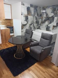 Posezení v ubytování Spa centar Doboj + 10 fotografií