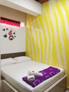 Postel nebo postele na pokoji v ubytování Hotel Jireh - San Carlos Ant