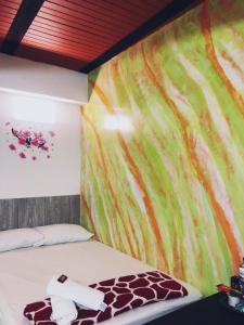 Postel nebo postele na pokoji v ubytování Hotel Jireh - San Carlos Ant