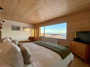 Postel nebo postele na pokoji v ubytování Line Hotel Patagonia