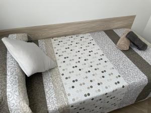 Postel nebo postele na pokoji v ubytování Moraira Calamora