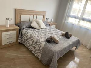 Postel nebo postele na pokoji v ubytování Moraira Calamora