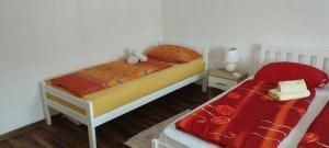 En eller flere senger på et rom på Apartment Dil