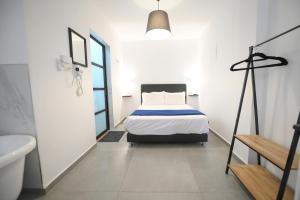Postel nebo postele na pokoji v ubytování Suites in the Galilee
