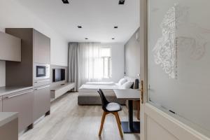 Posteľ alebo postele v izbe v ubytovaní Lampi Aparthotel Prague