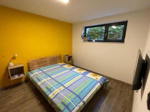 Ένα ή περισσότερα κρεβάτια σε δωμάτιο στο Homestay Manolov
