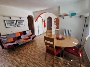 a living room with a couch and a table at Casa Morisca in Tossa de Mar