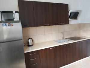 Kuchnia lub aneks kuchenny w obiekcie Apt with 6 single beds