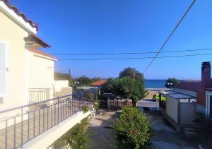 a view of the ocean from a house at Elli Studios & Apartments in Marathokampos
