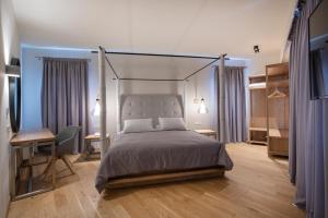 Voodi või voodid majutusasutuse Hotel Hermes toas