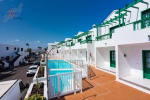Bazén v ubytování Vivienda Vacacional Casita del Mar nebo v jeho okolí