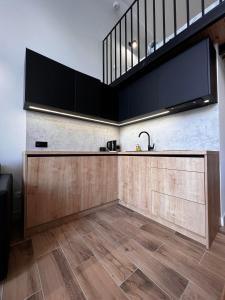Kuchyňa alebo kuchynka v ubytovaní Property Apart - plac Jana Pawla II Centrum