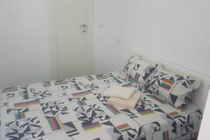 Ein Bett oder Betten in einem Zimmer der Unterkunft FAVORITE COMFORT