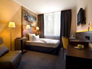Postel nebo postele na pokoji v ubytování Hotel König Ludwig II
