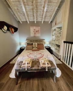 a bedroom with a large bed in a room at La Vierta Casa Rural Agroturismo in Ribadesella