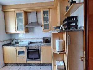 A kitchen or kitchenette at Casa Amarela