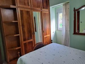 A bed or beds in a room at Casa Amarela