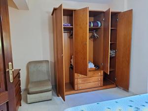 A bed or beds in a room at Casa Amarela