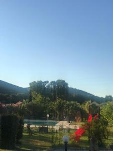 a view of a park with a playground at Agriturismo Isidoro in Fertilia