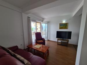 Μια τηλεόραση ή/και κέντρο ψυχαγωγίας στο Restaurant & Apartments Lipa