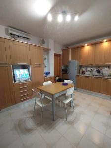 Kuchyňa alebo kuchynka v ubytovaní casa luisa3br