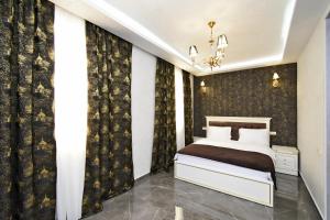 Ένα ή περισσότερα κρεβάτια σε δωμάτιο στο Macao Hotel