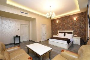 Ένα ή περισσότερα κρεβάτια σε δωμάτιο στο Macao Hotel