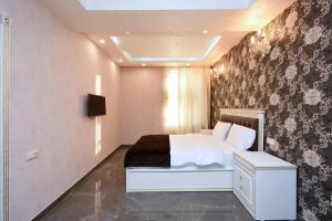 Ένα ή περισσότερα κρεβάτια σε δωμάτιο στο Macao Hotel