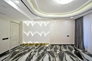 Ένα ή περισσότερα κρεβάτια σε δωμάτιο στο Macao Hotel