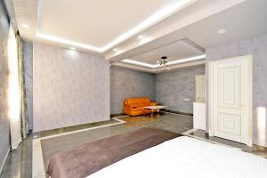 Ένα ή περισσότερα κρεβάτια σε δωμάτιο στο Macao Hotel