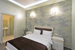 Postel nebo postele na pokoji v ubytování Macao Hotel