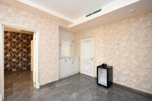 Kuchyň nebo kuchyňský kout v ubytování Macao Hotel