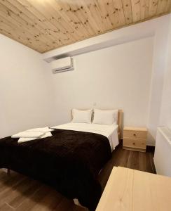 Tempat tidur dalam kamar di Agros Green Valley Suites