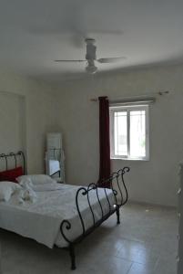 Ένα ή περισσότερα κρεβάτια σε δωμάτιο στο central square HOUSE kokalaki