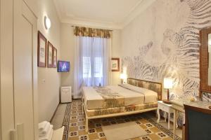 Кровать или кровати в номере MADAMA GUEST HOUSE