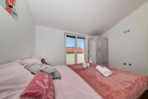 Voodi või voodid majutusasutuse Apartments Krepo toas